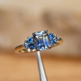 2.02ct Emerald Cut Bicolor Sapphire and Blue Sapphire Side Stone Cluster Ring in Two Tone 14k Yellow and White Gold