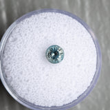 0.75CT BRILLIANT ROUND MADAGASCAR SAPPHIRE, PARTI AQUA WITH YELLOW, 5.31X3.63MM, UNTREATED