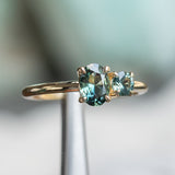 0.72ct Oval Parti Nigerian Sapphire and 0.30ct Round Montana Sapphire in 14k Yellow Gold