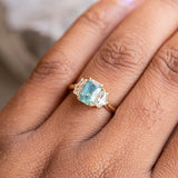 1.47ct Radiant Opalescent Teal Sapphire and White Sapphire Three Stone Ring in 14k Yellow Gold