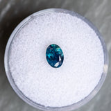 0.87CT OVAL NIGERIAN SAPPHIRE, DEEP TEAL BLUE, 6.94X5.03X3.12MM, UNTREATED