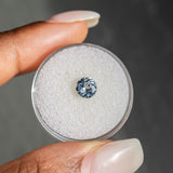 1.03CT Round Madagascar Sapphire, White Grey Sky Blue, 6.00x6.00x3.67MM, UNHEATED