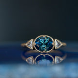 1.69ct Oval Nigerian Sapphire East-West and Trillion Diamond Three Stone Antique Milgrain Low Profile Ring in 18k Yellow Gold