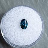 0.89CT OVAL NIGERIAN SAPPHIRE, DEEP OCEAL BLUE, 6.96X4.93MM, UNTREATED