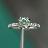 1.43ct Light Blue Montana Sapphire Double Claw Prong Solitaire with French Diamonds in Platinum