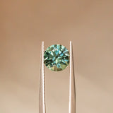 2.35CT ROUND PRECISION CUT MONTANA SAPPHIRE, TEAL BLUE, 7.90X5.22MM