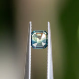0.74CT ASSCHER CUT NIGERIAN SAPPHIRE, PARTI GREEN TEAL AND YELLOW, 4.95X4.91X3.24MM, UNTREATED