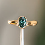 0.92ct Oval Sapphire Bezel Set Ring with Organic Alluvial Band In 14k Yellow Gold