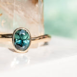 0.92ct Oval Sapphire Bezel Set Ring with Organic Alluvial Band In 14k Yellow Gold