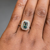 2.05ct Emerald cut Sapphire With Bezel Set Diamond Halo In 14k Yellow Gold