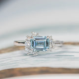 1.80ct Emerald Cut Denim Blue Sapphire and Asymmetrical Diamond Cluster Ring in Platinum