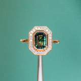 2.05ct Emerald cut Sapphire With Bezel Set Diamond Halo In 14k Yellow Gold