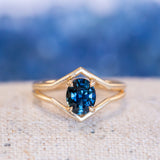 1.55ct Oval Sapphire Negative Space V Band Solitaire in 18k Yellow Gold