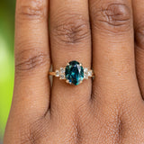 2.63ct Oval Untreated Nigerian Sapphire and Diamond Cluster Ring in 14k Yellow Gold
