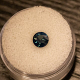 1.10CT ROUND NIGERIAN SAPPHIRE, DEEP TEAL, 6.26X6.18MM, UNTREATED