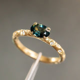 0.85ct Oval Sapphire in 14k Yellow Gold Evergreen Solitaire with Scattered Embedded Diamonds