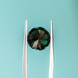 4.40CT FANCY ROUND AFRICAN SAPPHIRE, DEEP GREEN, 9.55X6.35MM