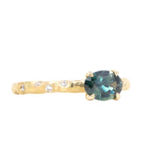 0.85ct Oval Sapphire in 14k Yellow Gold Evergreen Solitaire with Scattered Embedded Diamonds