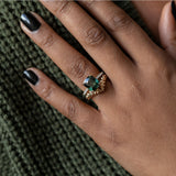 4.52ct Forest Green Radiant Cut Sapphire Double Claw Prong Solitaire with Diamonds in 14k Yellow Gold on hand with vine band