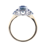 2.02ct Emerald Cut Bicolor Sapphire and Blue Sapphire Side Stone Cluster Ring in Two Tone 14k Yellow and White Gold