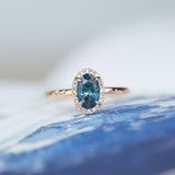1.19ct Blue Oval Montana Sapphire Ring in 14k Rose Gold Evergreen Diamond Halo