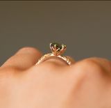 1.68ct Oval Teal Sapphire Lotus Six Prong Solitaire Ring in 14k Yellow Gold on hand