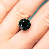 4.40CT FANCY ROUND AFRICAN SAPPHIRE, DEEP GREEN, 9.55X6.35MM