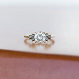 Grey Moissanite and Black Diamond Side Stone Cluster Ring