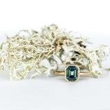 2.12ct Light Teal Emerald Cut Sapphire Bezel Evergreen Setting 14k Yellow Gold Low Profile