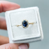 1.32ct Royal Blue Oval Sapphire Halo Ring - Evergreen Carved Band in a Satin Finish 14k Yellow Gold