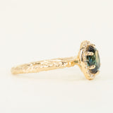 1.63ct Oval Deep Blue Unheated Sapphire and Diamond Six Prong Halo Evergreen Ring in 14k Yellow Gold