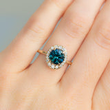 1.99ct Round Montana Sapphire in Low Profile Oval-Esque Tapered Diamond Halo, 14k Yellow Gold