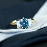 1.96ct Oval Sapphire and Baguette Diamond Three Stone Ring In 18k Yellow And Platinum