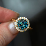 4.27ct Blue Madagascar Sapphire Six Prong Halo Evergreen Ring in 18k yellow gold