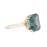 5.67ct Radiant Cut Teal Sapphire Ring with French Set Diamond Studded Band in 18k Rose Gold