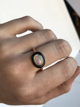Opal and black jade cabochon ring in 14k Yellow Gold on hand
