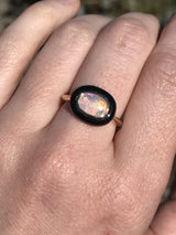 Opal and black jade cabochon ring in 14k Yellow Gold on hand