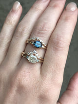 Three Stone Ring featuring 1.06 reclaimed cushion diamond in East-West setting