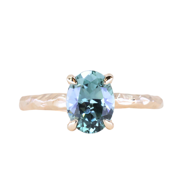 1.58ct Oval Untreated Light Blue Montana Sapphire Evergreen Carved 4 Prong Solitaire in 14k Yellow Gold