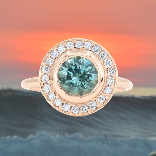 1.95ct Teal Montana Sapphire With Bezel Set Diamond Halo In 14k Rose Gold