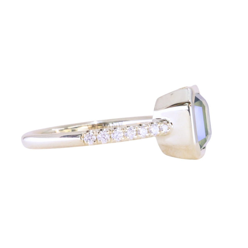 2.18ct Emerald Cut Parti Madagascar Sapphire Low Profile Bezel Solitaire Ring with Pavé Set Diamonds in 14k Green Gold