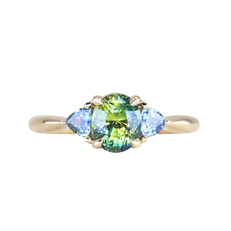 1.61ct Oval Madagascar Parti Sapphire and Trillion Sapphire Three Stone Low Profile Ring in 14k Yellow Gold