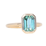 2.62ct Teal Green Emerald Cut Sapphire Low Profile Bezel Ring in 14k Yellow Gold