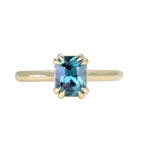 1.68ct Radiant Cut Teal Sapphire Cathedral Double Prong Solitaire in 18k Yellow Gold