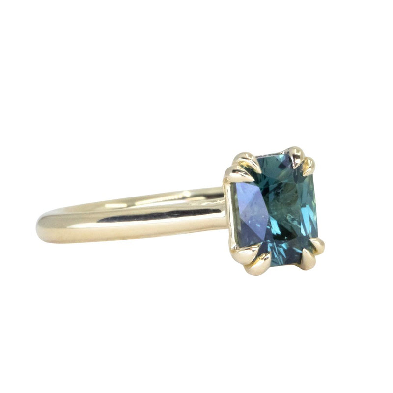 1.68ct Radiant Cut Teal Sapphire Cathedral Double Prong Solitaire in 18k Yellow Gold