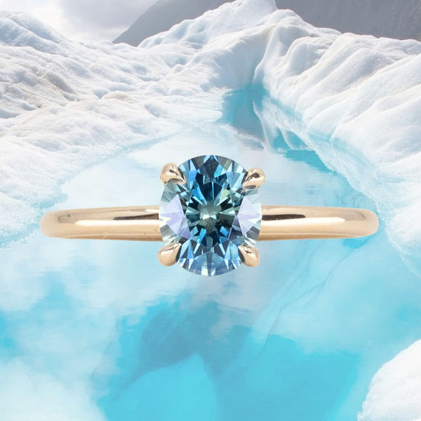 1.32ct Precision Cut Oval Teal Montana Sapphire Classic 4 Prong Solitaire in 14k Yellow Gold