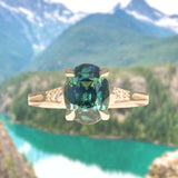 3.22ct Teal Oval Madagascar Sapphire and Diamond Vintage Cathedral Four Prong Ring in 14k Yellow Gold