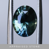 2.69CT OVAL MADAGASCAR SAPPHIRE, PARTI BLUE WITH TEAL, 9.65X7.52X5.15MM - APPRAISED STONE