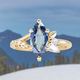 1.85ct Ocean Blue Marquise Madagascar Sapphire in Wandering Vine Low Profile 4 Prong Setting with Diamonds in 14k Yellow Gold