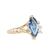1.85ct Ocean Blue Marquise Madagascar Sapphire in Wandering Vine Low Profile 4 Prong Setting with Diamonds in 14k Yellow Gold